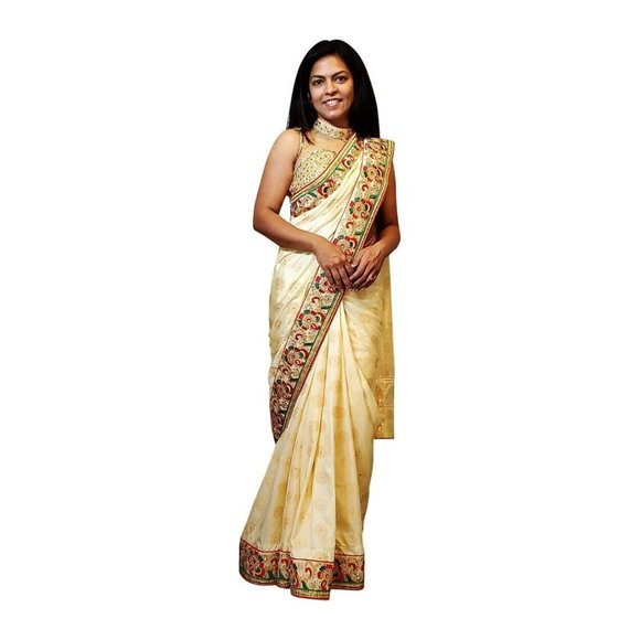 Cream colored brocade soft saree with embroidered border - Picture 1 of 3